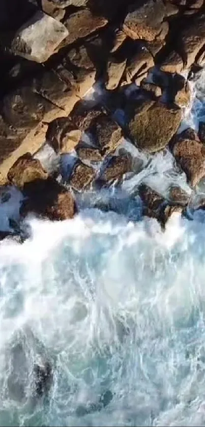 Aerial view of rocky coastline with waves.