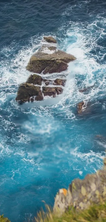 Ocean waves crashing against rocky cliffs on a beautiful turquoise coastline.