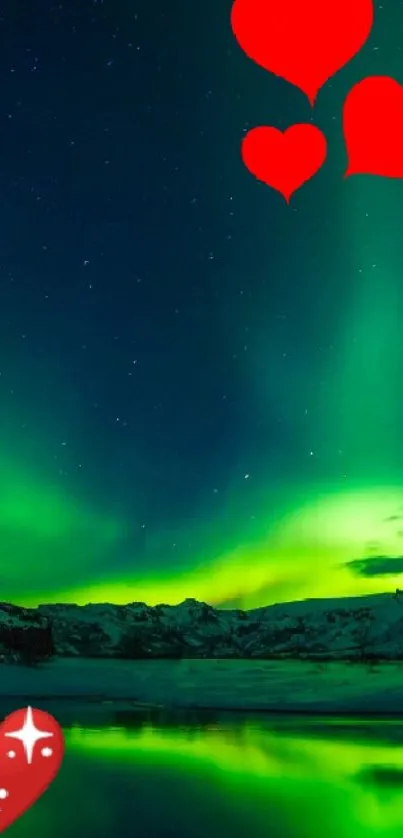 Aurora borealis illuminates snowy mountains with romantic red hearts above.