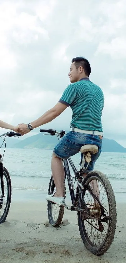 A couple cycling along a scenic beach.