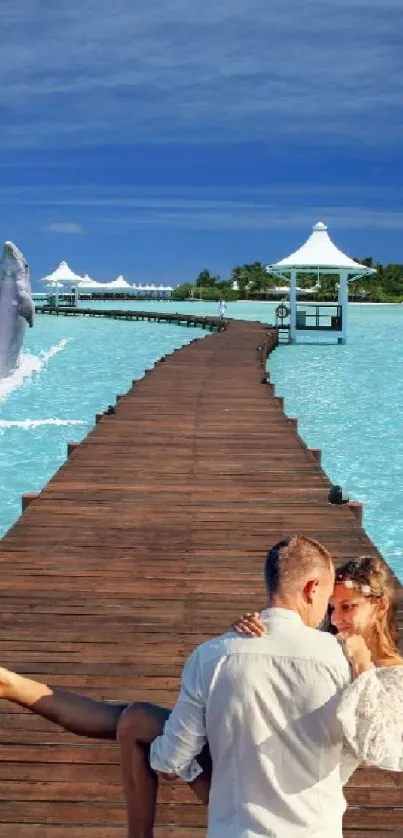 Romantic couple on pier with dolphin and turquoise ocean.