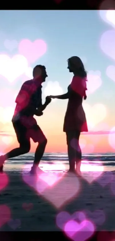 Silhouette couple with hearts at sunset beach.