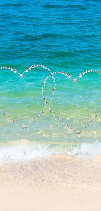 Two hearts over a serene beach with blue ocean.