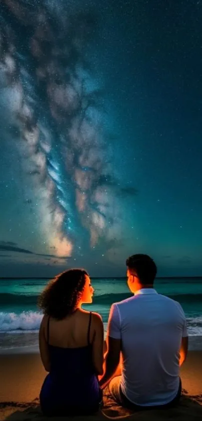 Couple on beach under starry night sky wallpaper.