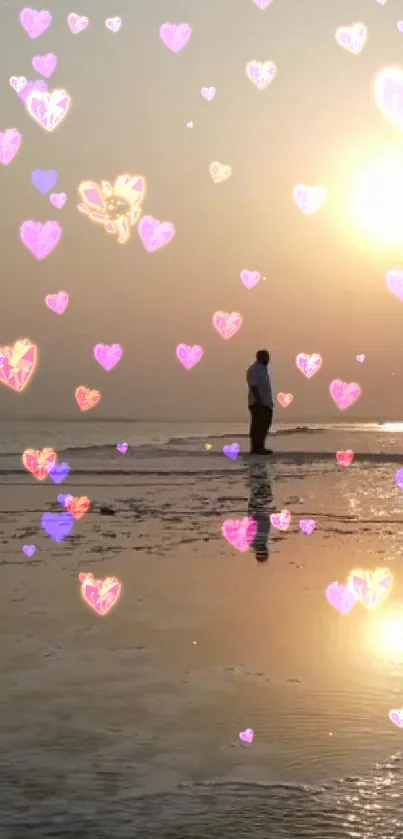 Romantic beach sunset with floating pink hearts and couple's silhouette.