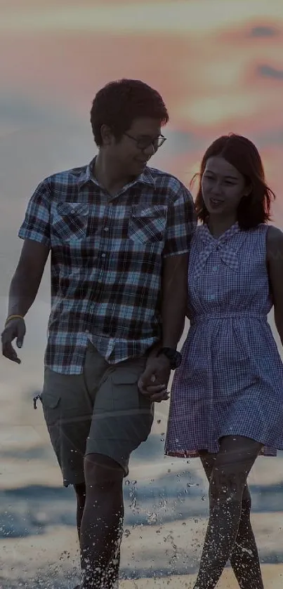 Couple walking on beach at sunset, romantic wallpaper.