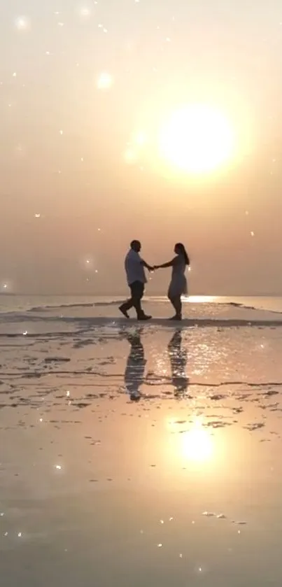 A couple holding hands at sunset on a tranquil, reflective beach.