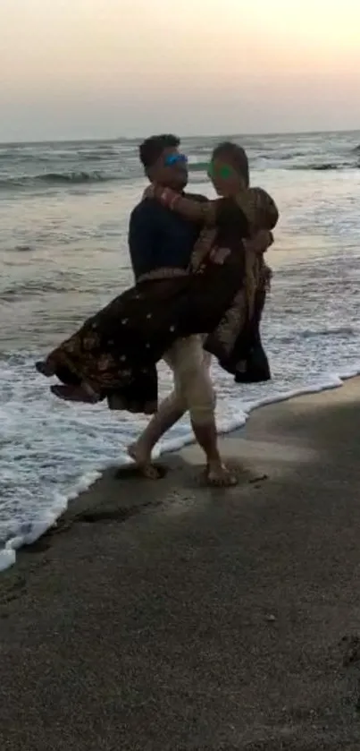 Couple enjoying romantic beach sunset stroll.