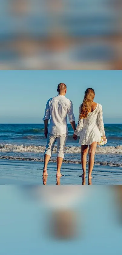 Couple walking on a tranquil beach, embraced by ocean waves.