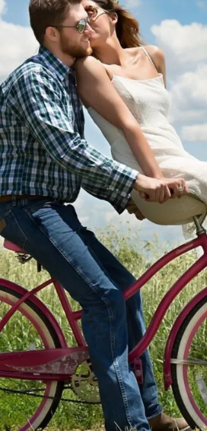 Couple on a bicycle under blue sky, sharing a romantic moment.