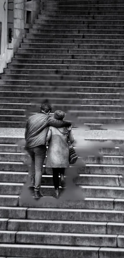 Romantic couple walking up stairs in black and white.