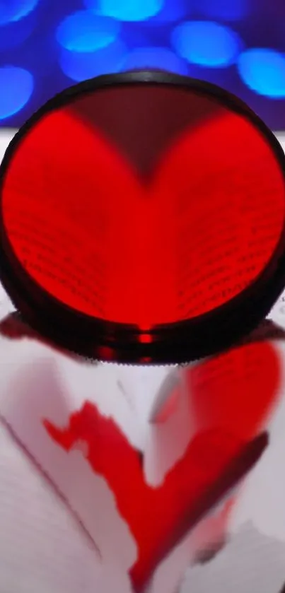 Heart-shaped shadow on a book creates a romantic effect with red and blue colors.