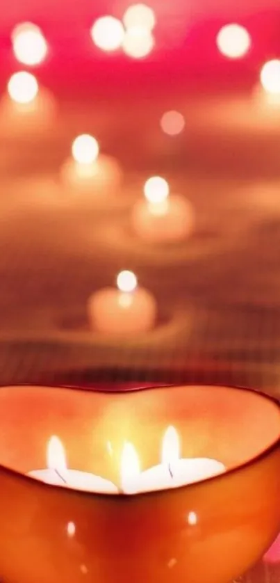 Heart-shaped candle holder with glowing lights on a warm backdrop.