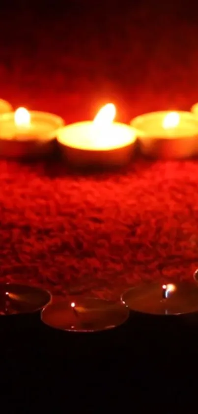 Romantic candlelight on rich red background.