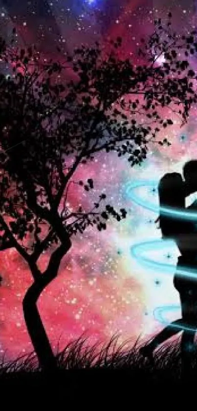 Silhouette of couple under a vibrant cosmic sky with a tree in foreground.