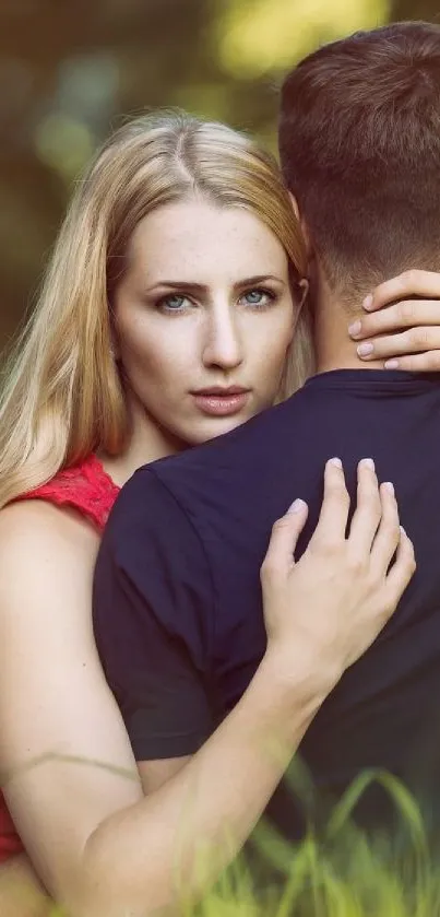 Romantic couple in embrace with nature background.