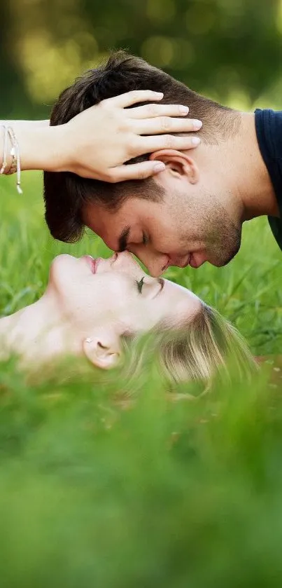 Romantic couple laying in green grass, sharing a serene and intimate moment.