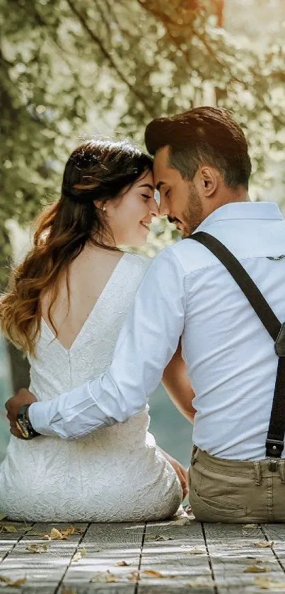 Romantic couple embracing in nature, sitting with backs turned.