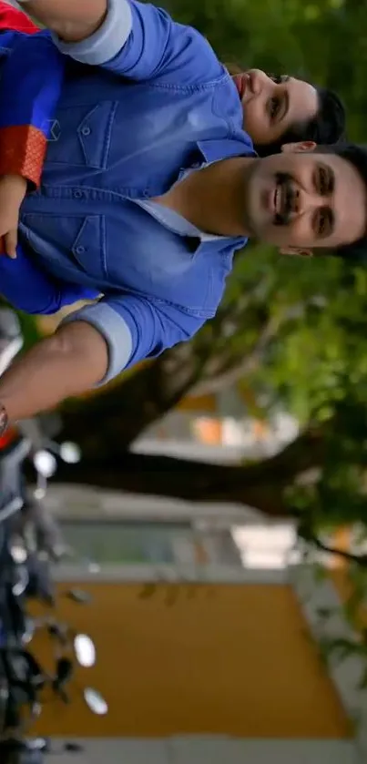 Couple riding a scooter amidst lush greenery.