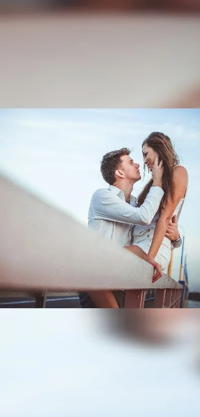 Romantic couple embracing by the seaside.