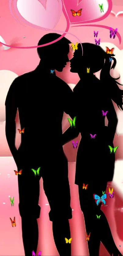 Romantic couple silhouette with butterflies on a pink background wallpaper.