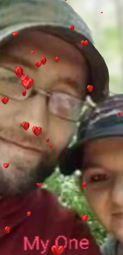 Couple smiling with floating red hearts overlay.