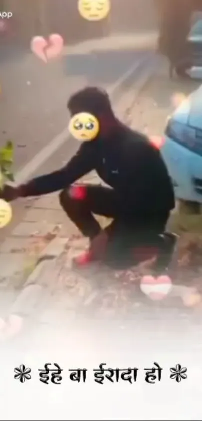 Person kneeling on street with heart emojis.