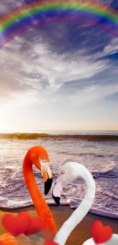 Flamingos by ocean with a rainbow in the sky and hearts on the beach.