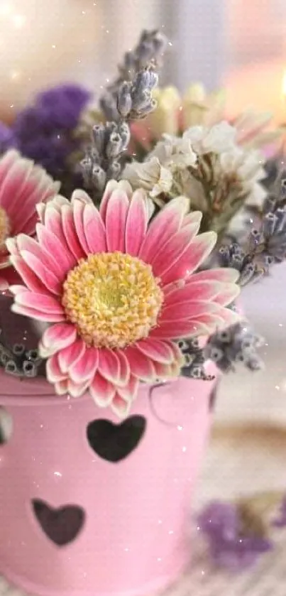 Pink bucket with daisies and lavender blooms.