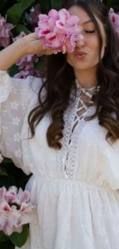 Woman in white dress among pink flowers, romantic wallpaper.