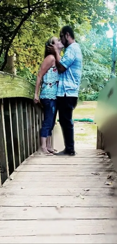 Couple kissing on a wooden bridge in a lush green forest.