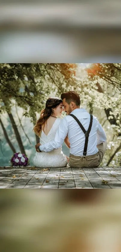 Couple embracing in a sunlit forest setting, seated on a wooden deck.