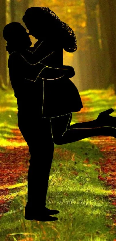 Silhouette of couple embracing in a sunlit autumn forest path.