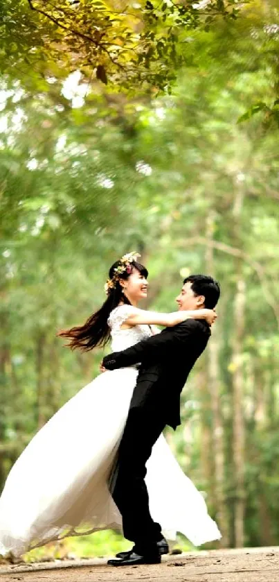 Romantic couple in forest wedding setting with lush greenery.