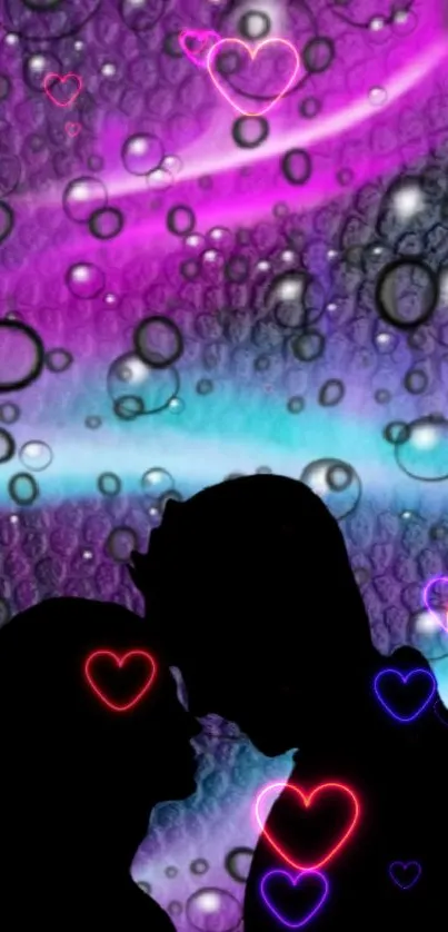 Silhouette of a couple with heart motifs against a purple galaxy background.