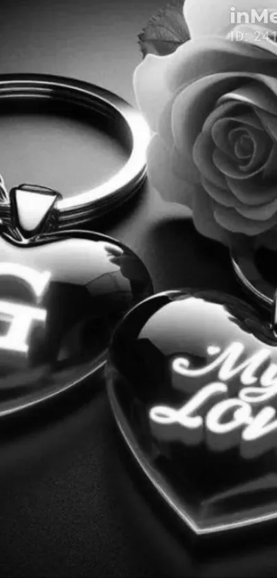 Romantic black and white heart locket and rose wallpaper.