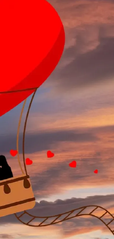 Romantic heart-shaped balloon floats against a vibrant sunset sky.