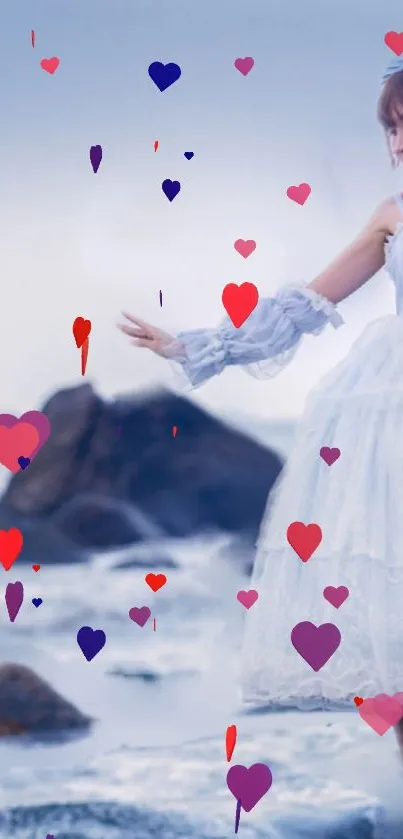 Romantic beach scene with hearts overlay.