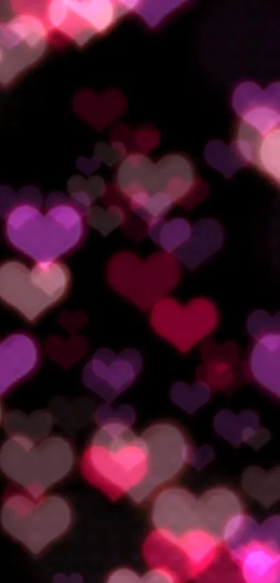 Romantic heart bokeh wallpaper with pink and purple hues.