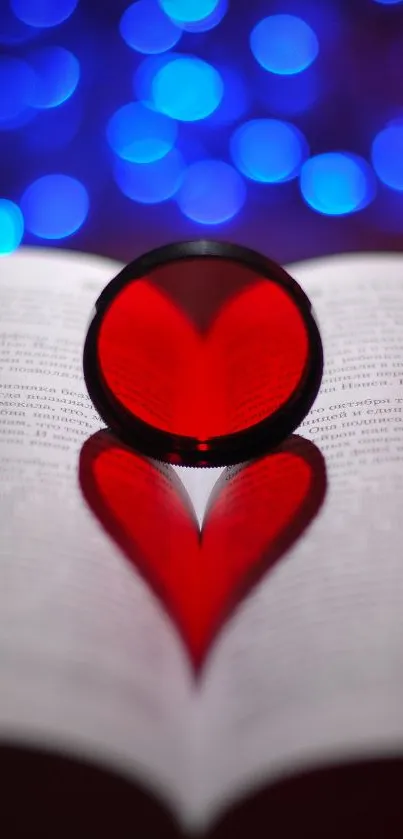 Romantic heart shadow on book with blue bokeh background.