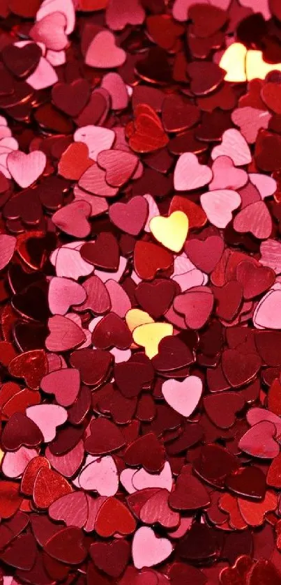 Red and pink heart-shaped confetti wallpaper for mobile.