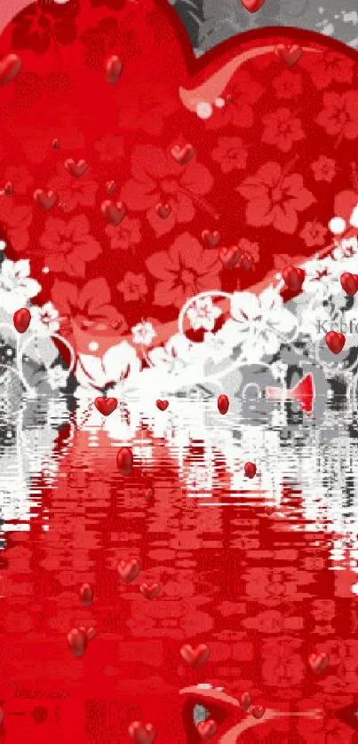 Red heart with floral pattern and water reflection.