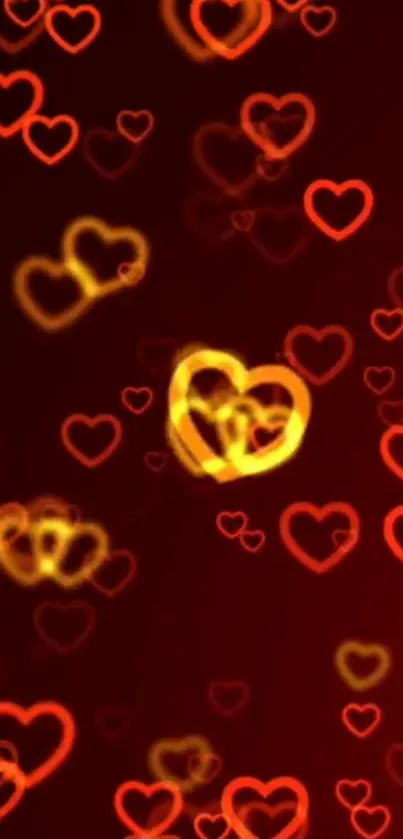 Red and gold heart design glowing on a dark background.