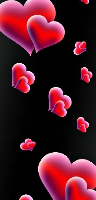 Romantic black wallpaper with gradient pink and red hearts design.