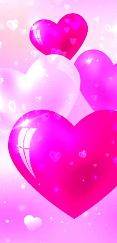 Pink and magenta glowing hearts wallpaper.