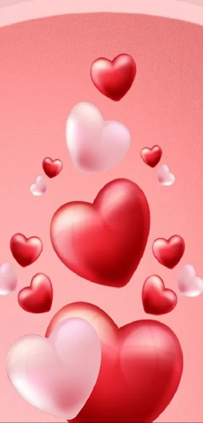 Floating red and pink hearts on a romantic wallpaper background.