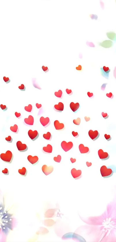 Red hearts with floral accents on a white background wallpaper.