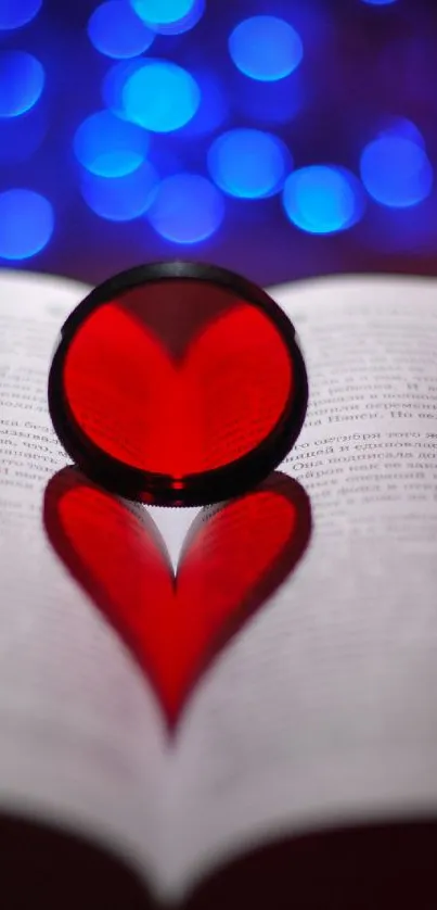 Heart shadow on book with blue bokeh lights.