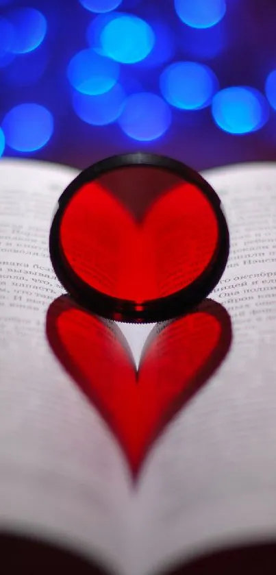 Heart shadow cast on book page with blue lights in background.