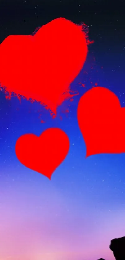 Romantic wallpaper with red hearts on a blue gradient sky background.